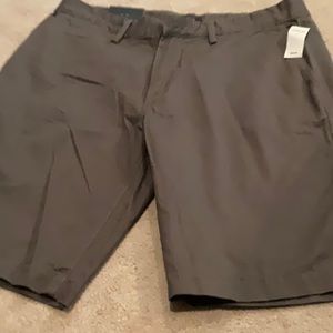 Gap Khakis, new with tags, men’s short, size 34.  Khaki green color, flat front